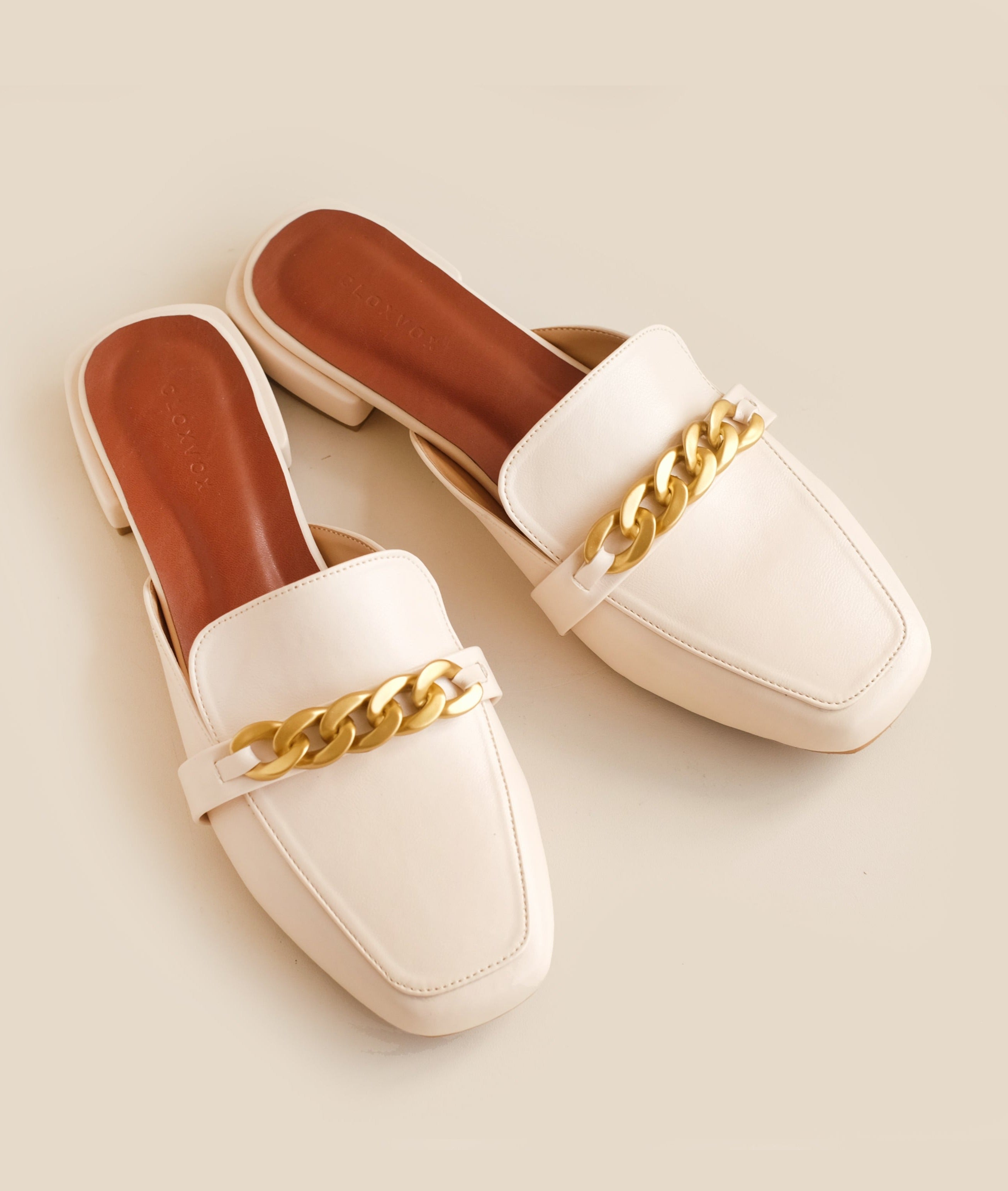 Loewy Mules In Ivory