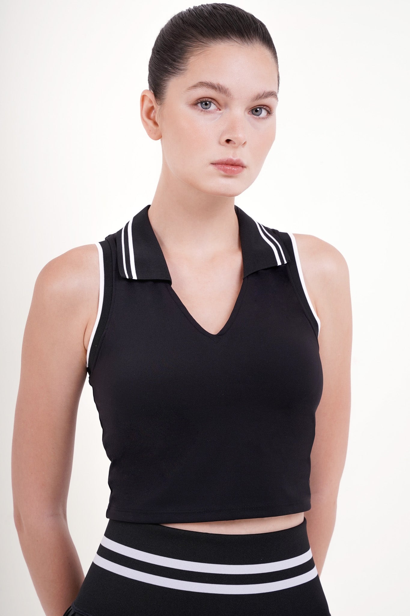 Serve Contrast Polo Top in Black