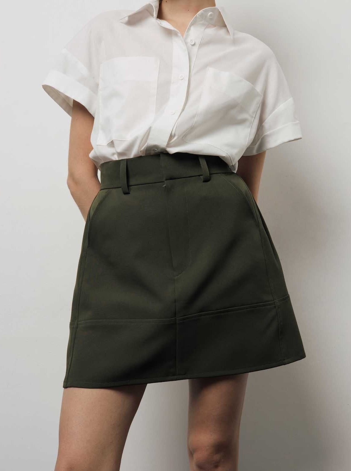 Colin Mini Skirts In Olive Green
