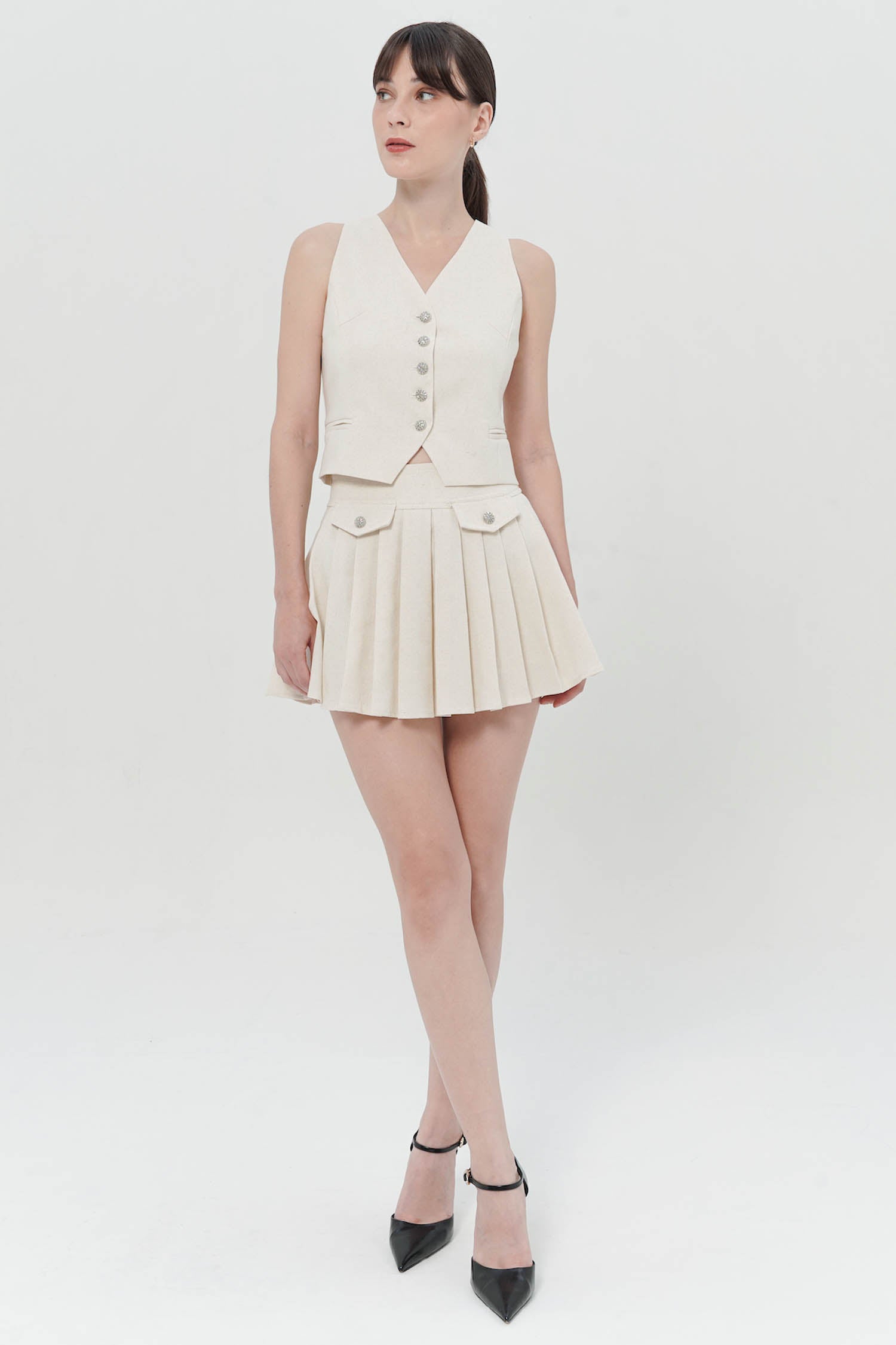 Kaelan Pleated Mini Skort In Creme