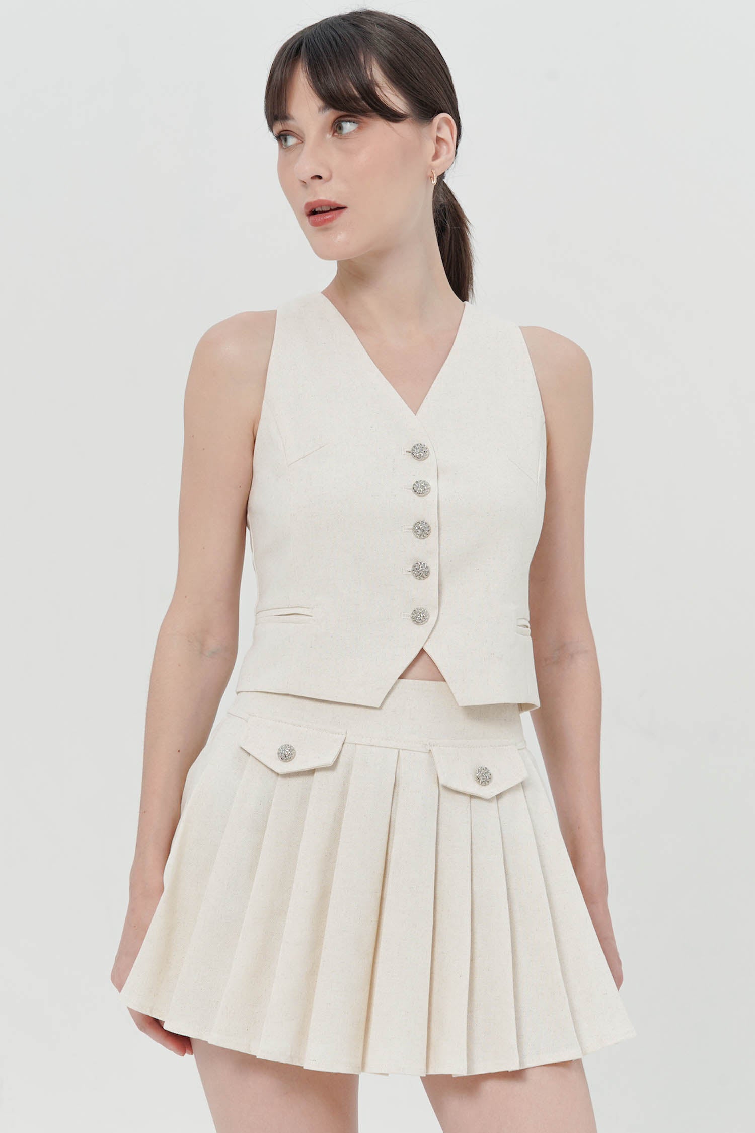 Kaelan Pleated Mini Skort In Creme