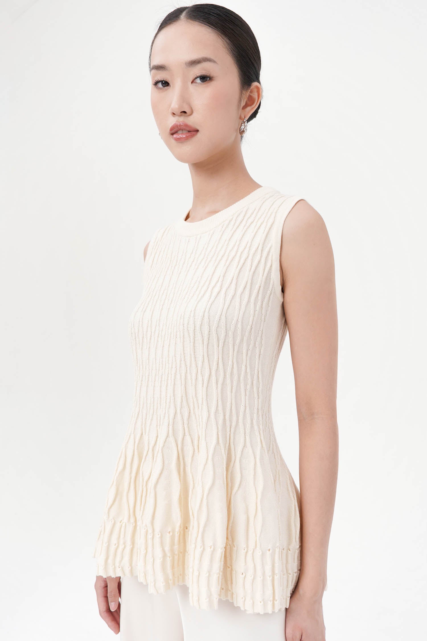 Dakota Peplum Knit Top In Creme