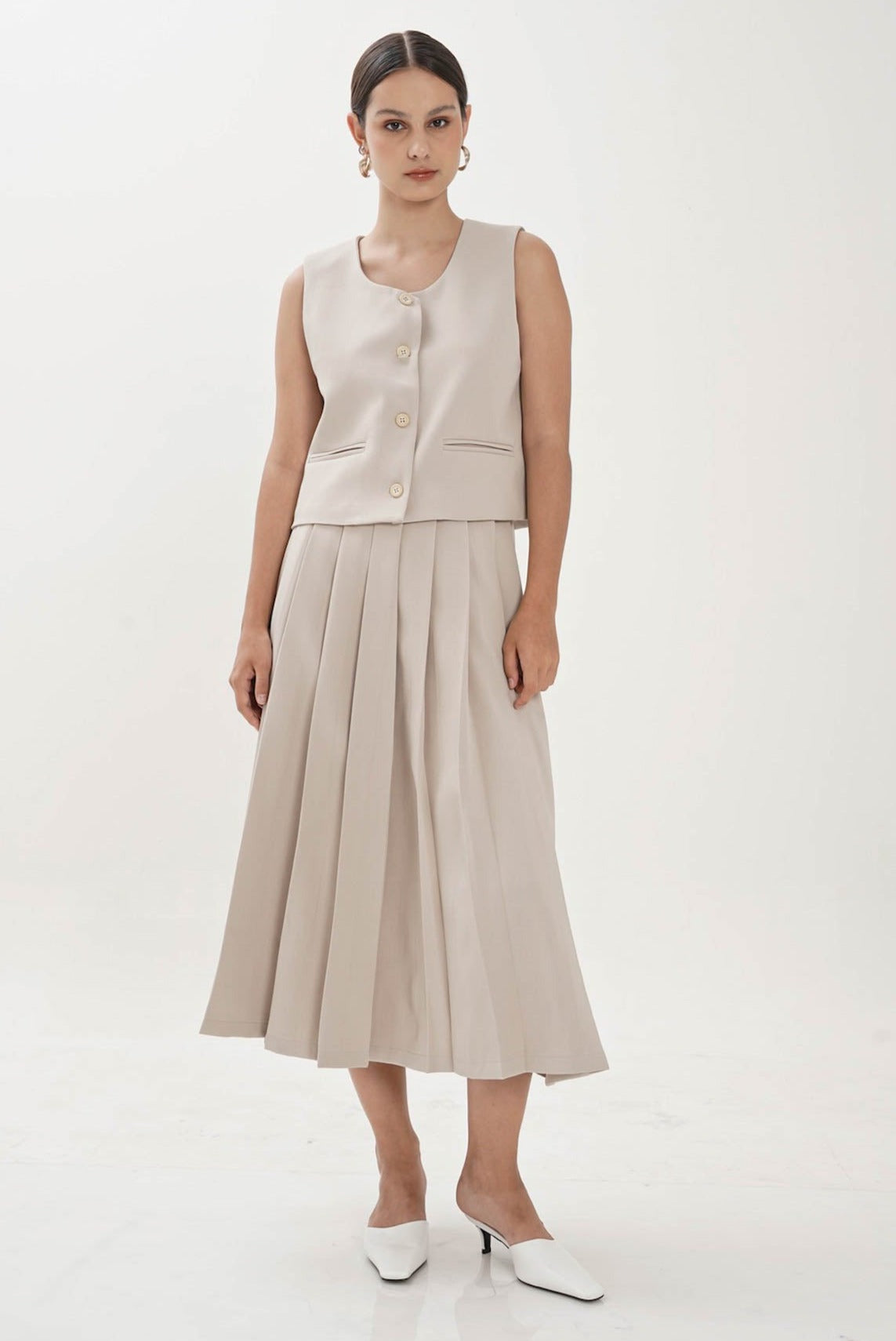 Omara Pleated Midi Skirt In Beige