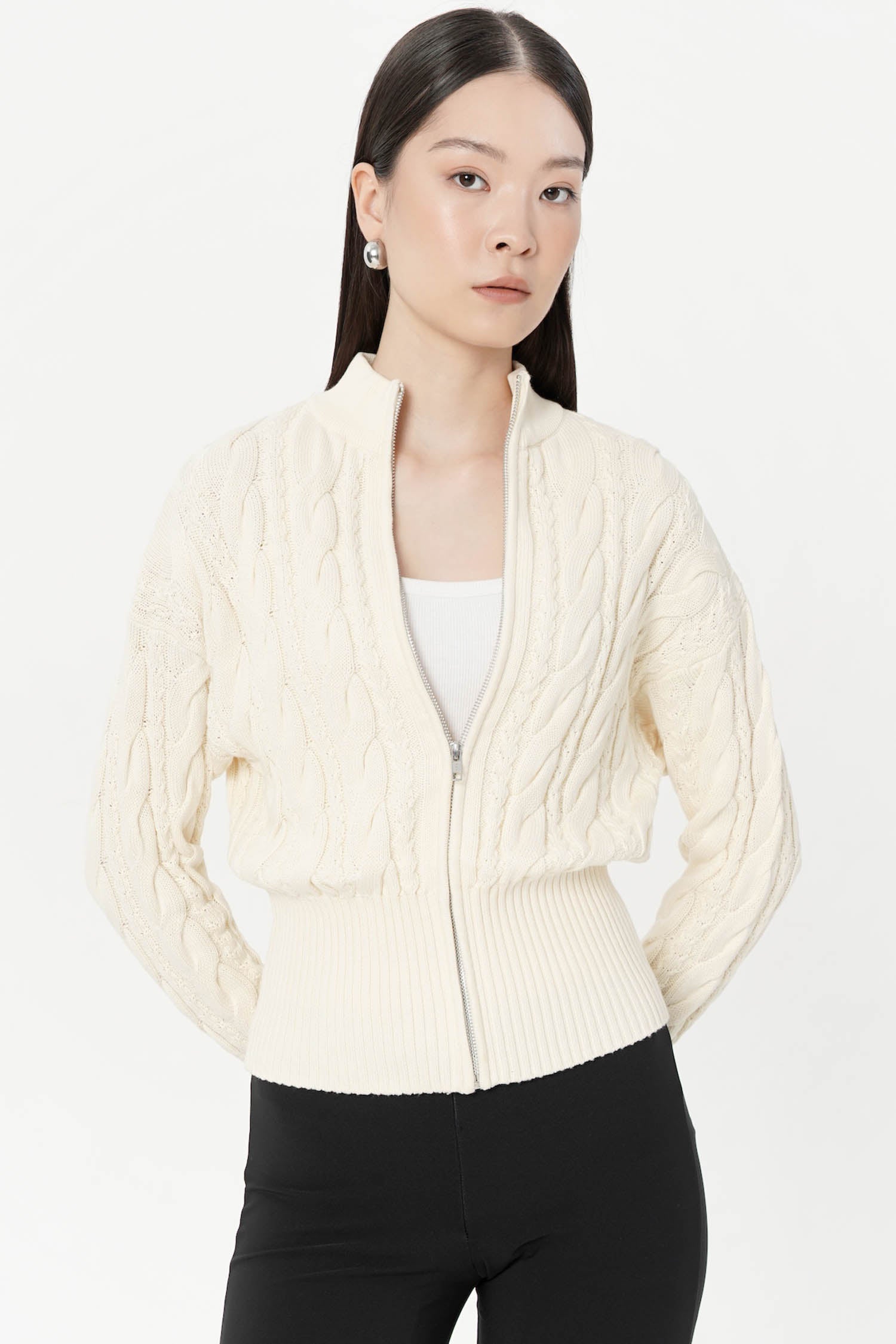 Oryx Cable Knit Cardigan In Creme