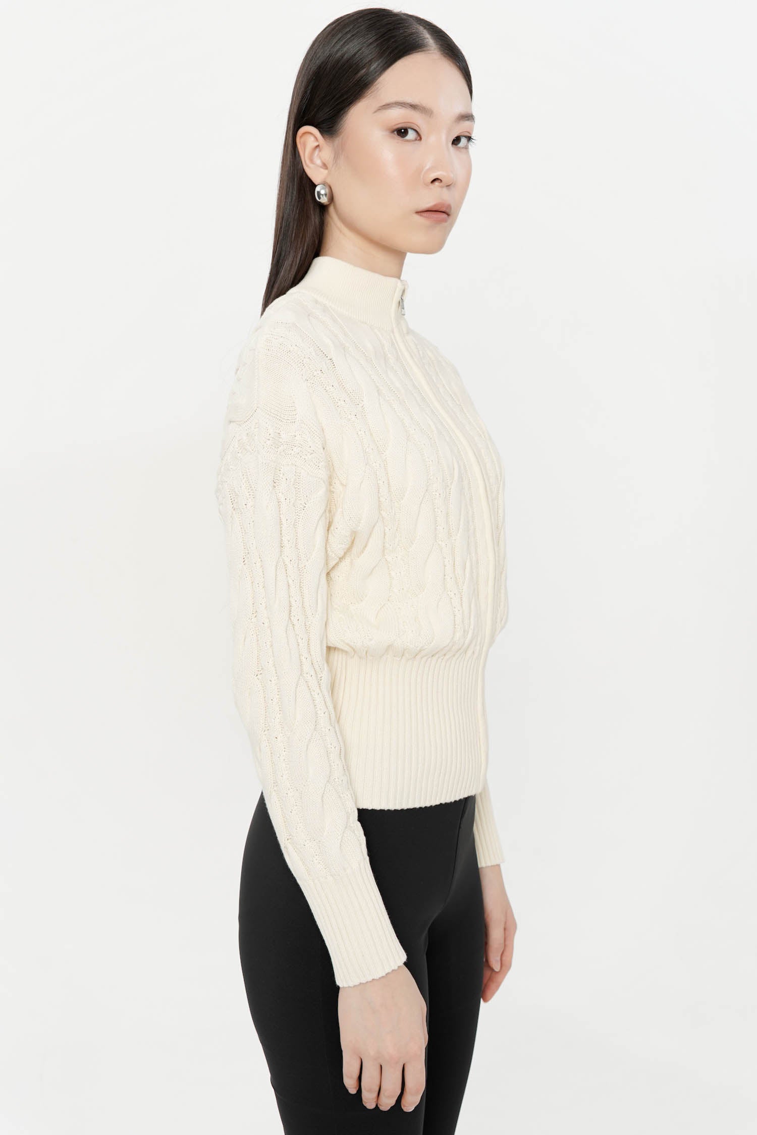 Oryx Cable Knit Cardigan In Creme