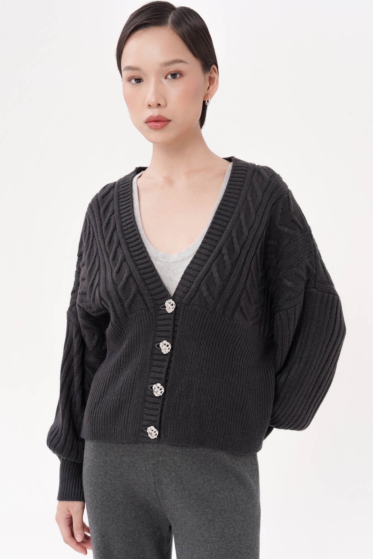 Gambit Cable Knit Cardigan In Dark Grey