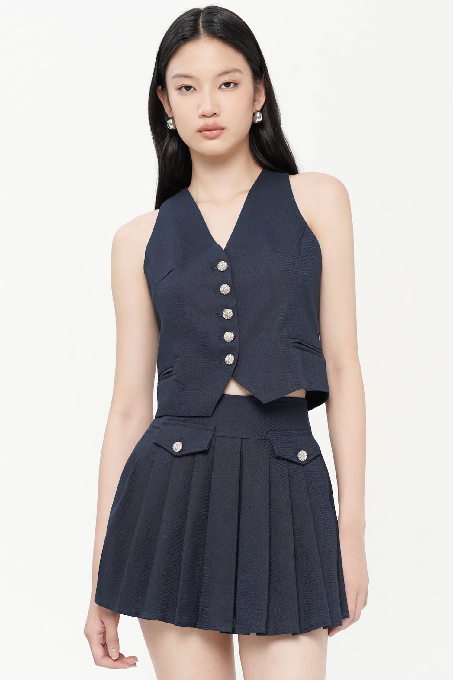 Kaelan Pleated Mini Skort In Navy