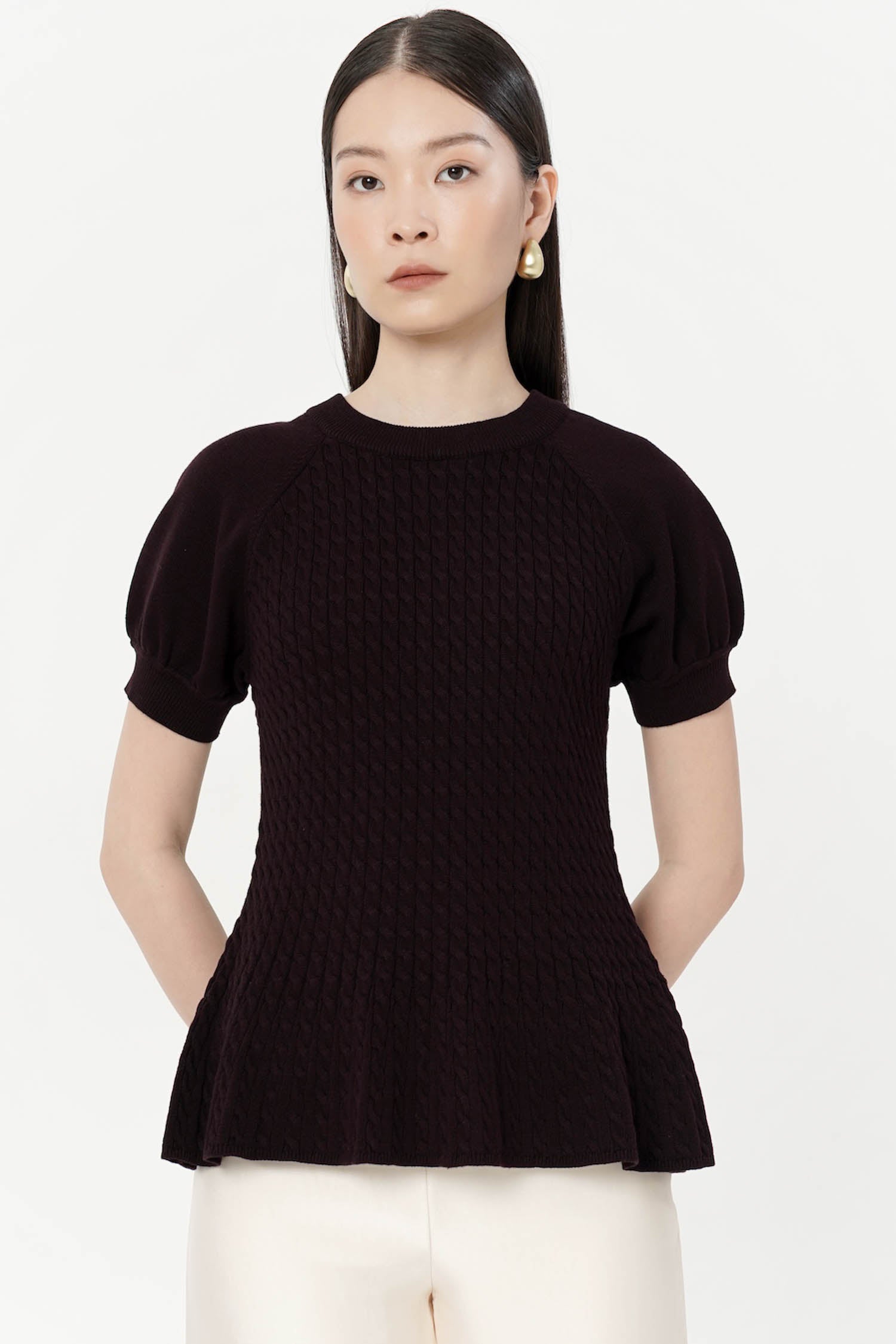 Zola Peplum Knit Top In Wine