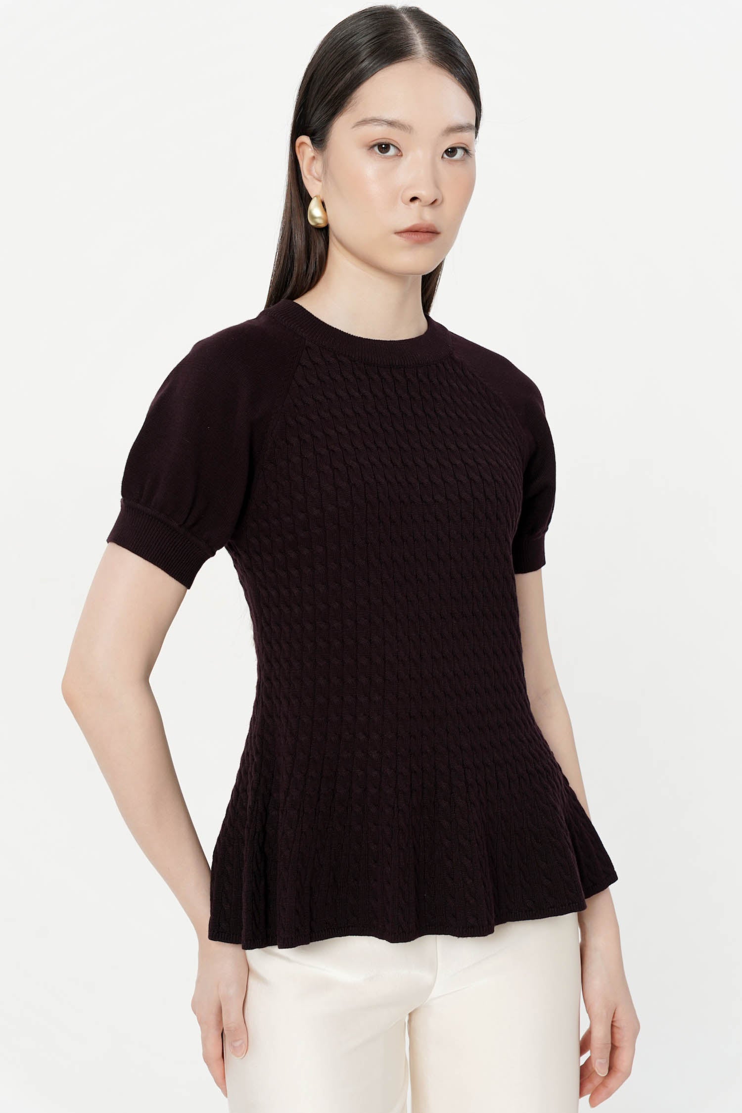 Zola Peplum Knit Top In Wine