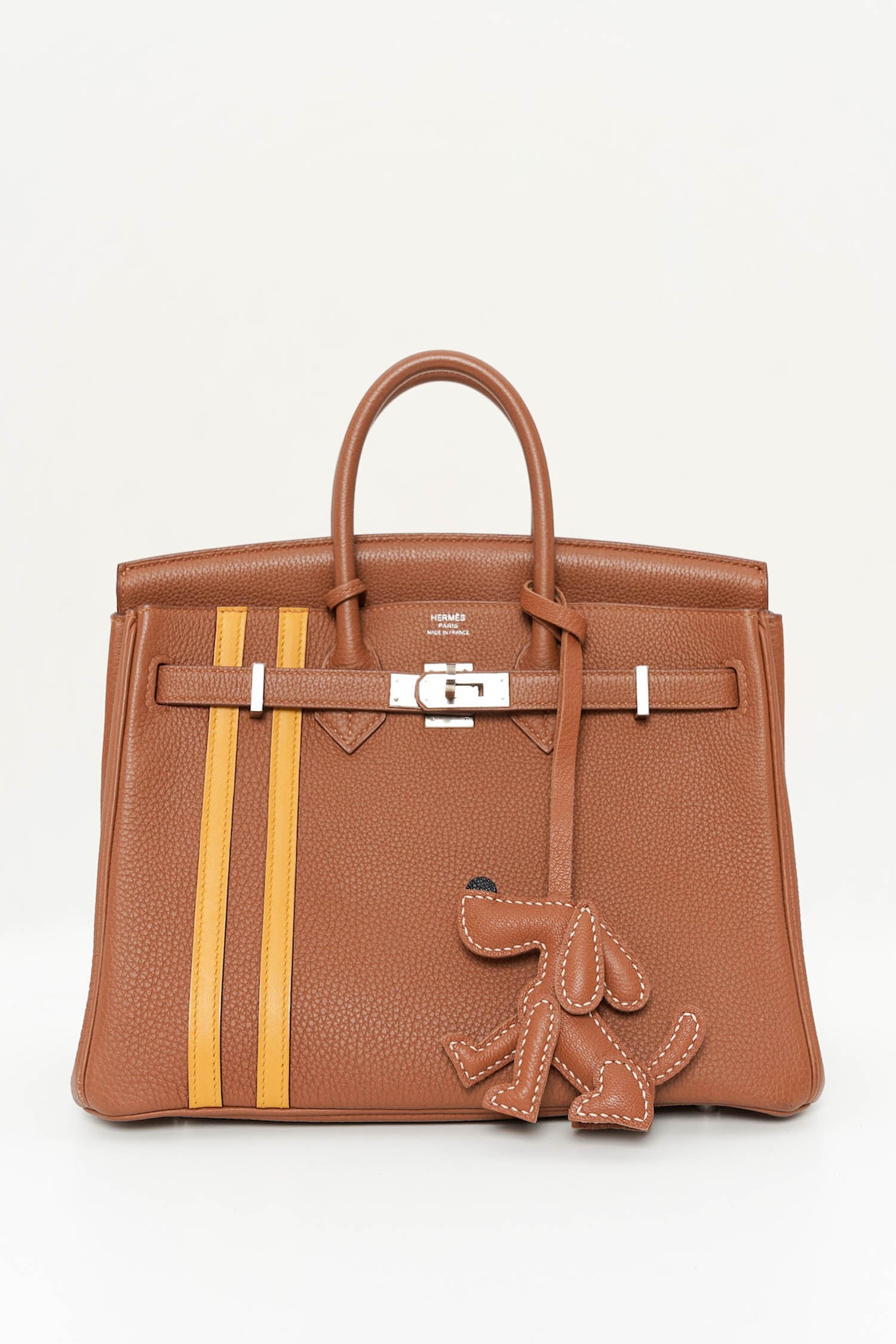 Sit Pretty Puppy Leather Charm In Brown