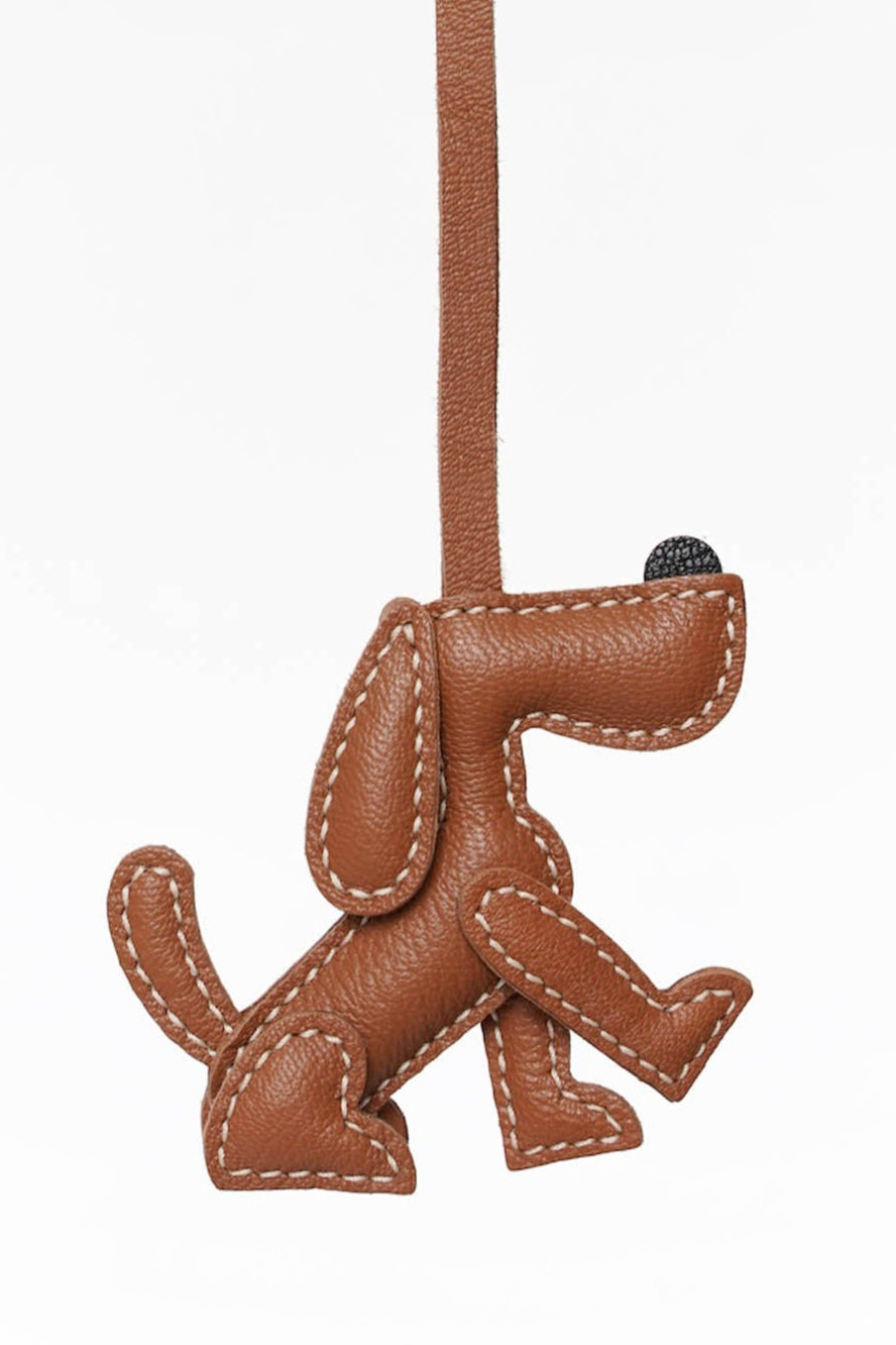 Sit Pretty Puppy Leather Charm In Brown